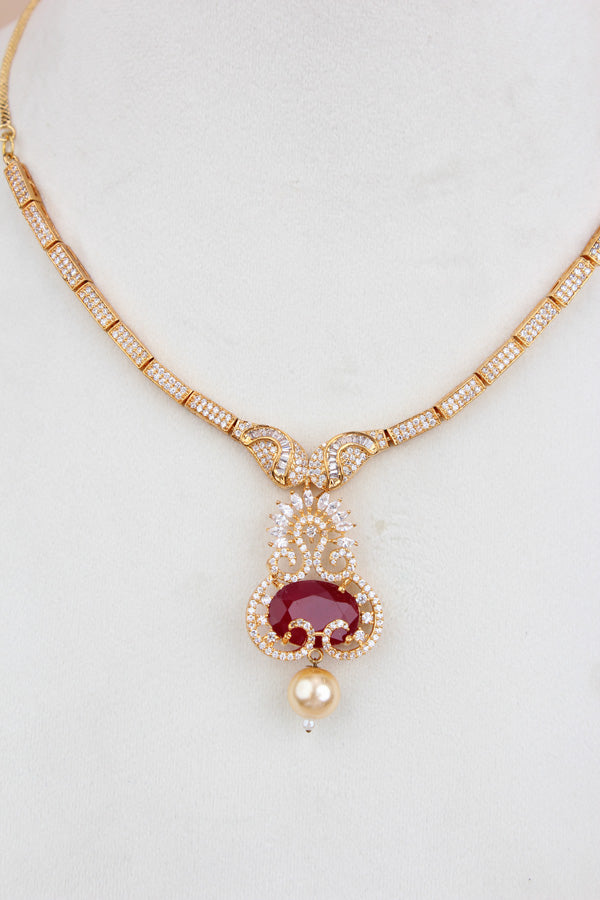 Premium Quality Gold Polish Pendant Set With American Diamonds Center Ruby Stone And Matching Earrings (PS017)