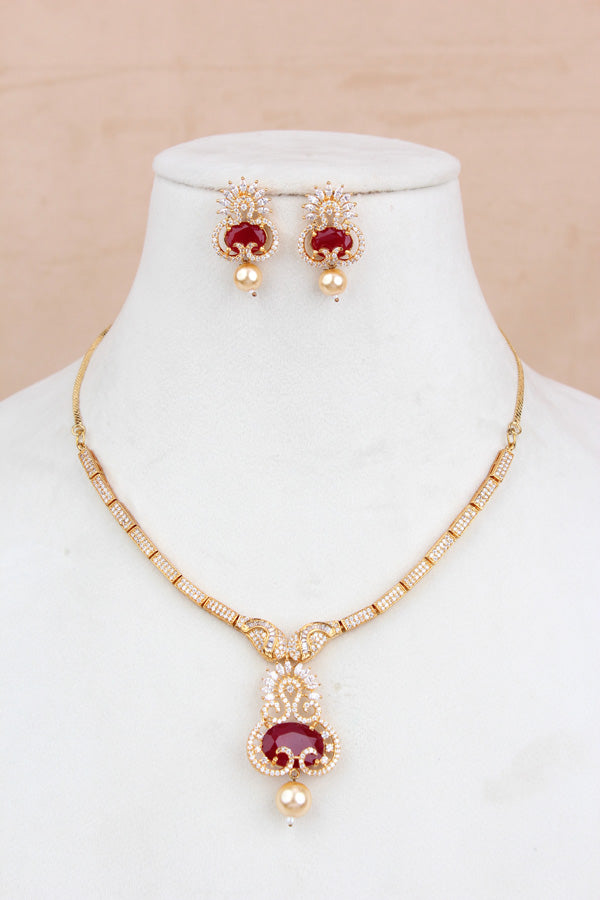 Premium Quality Gold Polish Pendant Set With American Diamonds Center Ruby Stone And Matching Earrings (PS017)