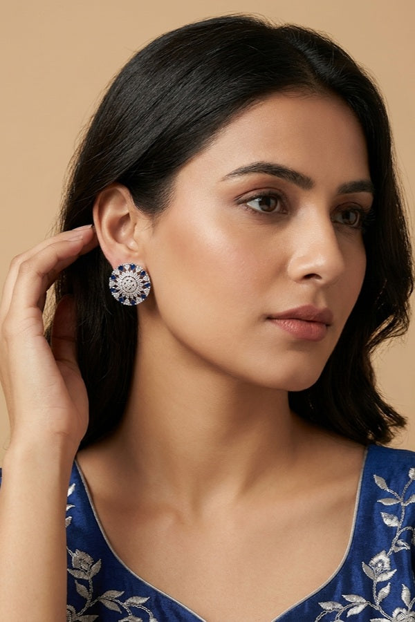 Round Flower Shape Studs In Blue Colour With American Diamonds
