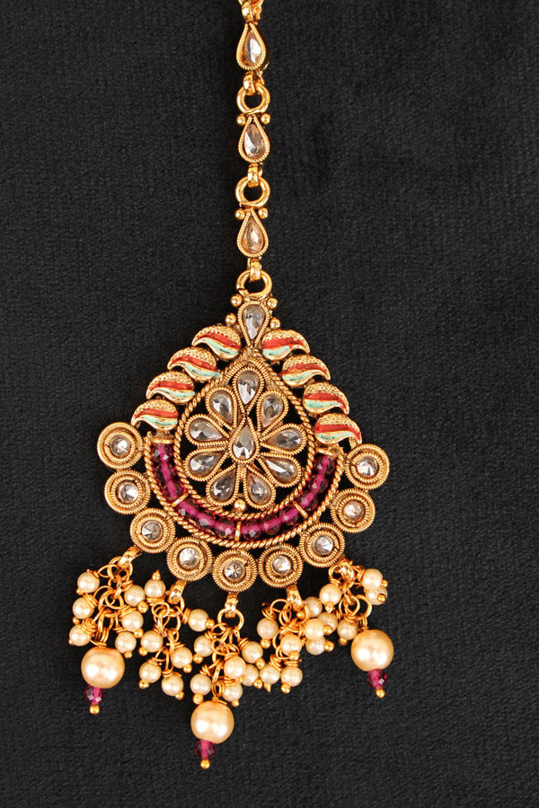 Tikka In Gold Polish With Reverse AD Stones And Purple Crystal Beads (T010-PU-Polki)