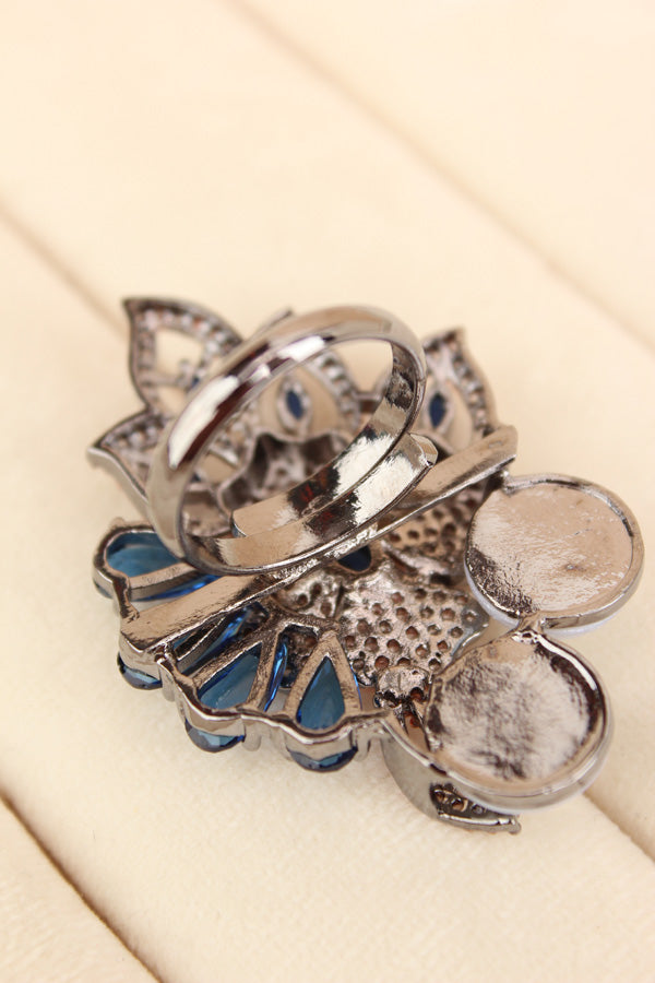 Adjustable American Diamond Ring With Flower Design And Pearls Attached In Blue (ADR003-B)