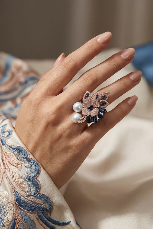 Adjustable American Diamond Ring With Flower Design And Pearls Attached In Blue (ADR003-B)