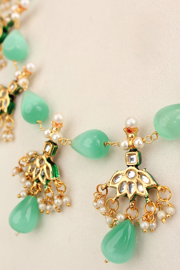Aqua Green Colour Cat Eye Pearls With A Shiny Finish And Kundan Look Pendants Attached (MA007-AG)