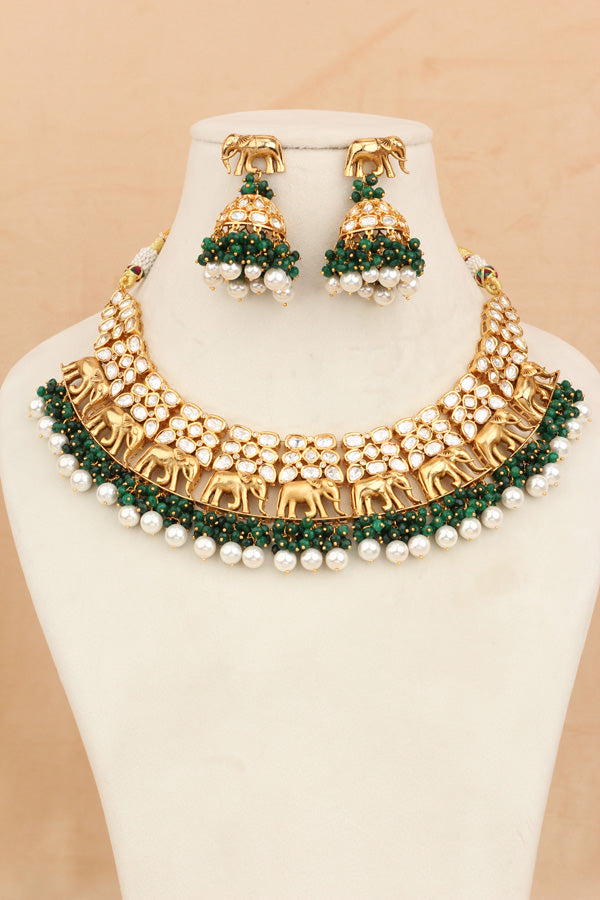 Elephant Motif Kundan Necklace Set With White Pearls And Green Beads Attached With Matching Jhumka Earrings (NKS034-G)