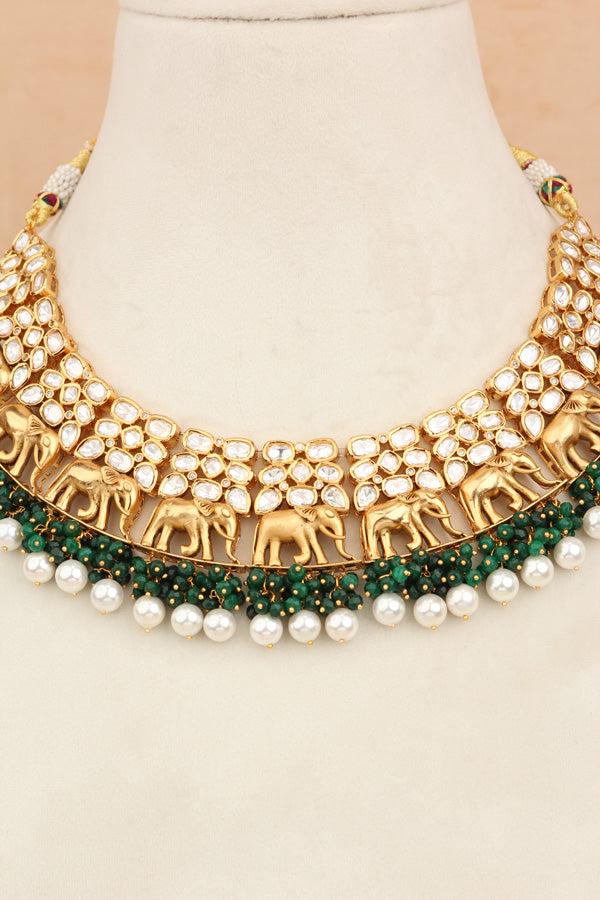 Elephant Motif Kundan Necklace Set With White Pearls And Green Beads Attached With Matching Jhumka Earrings (NKS034-G)