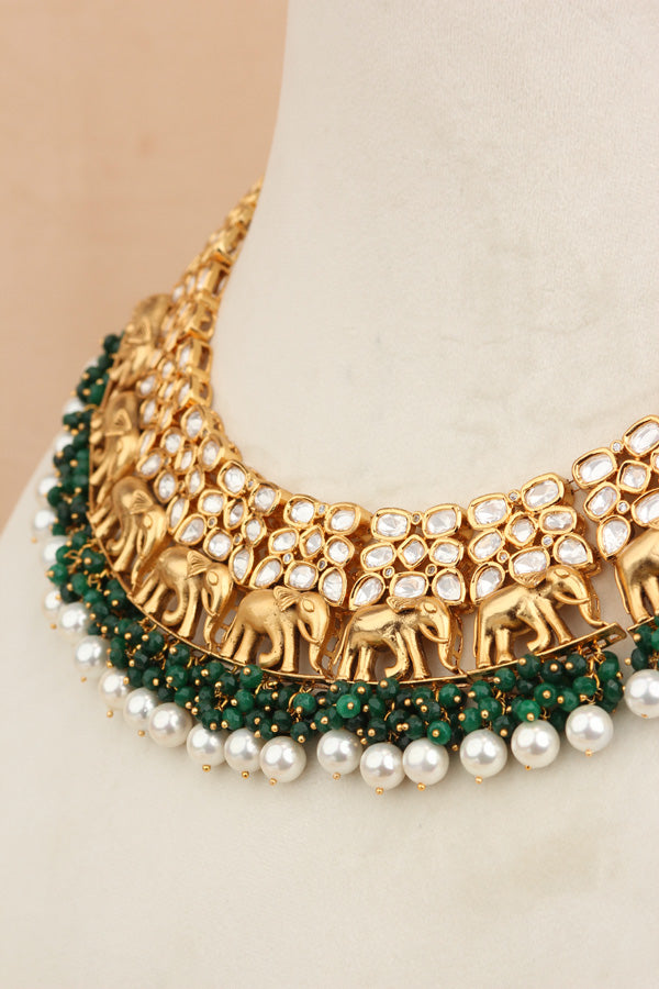 Elephant Motif Kundan Necklace Set With White Pearls And Green Beads Attached With Matching Jhumka Earrings (NKS034-G)