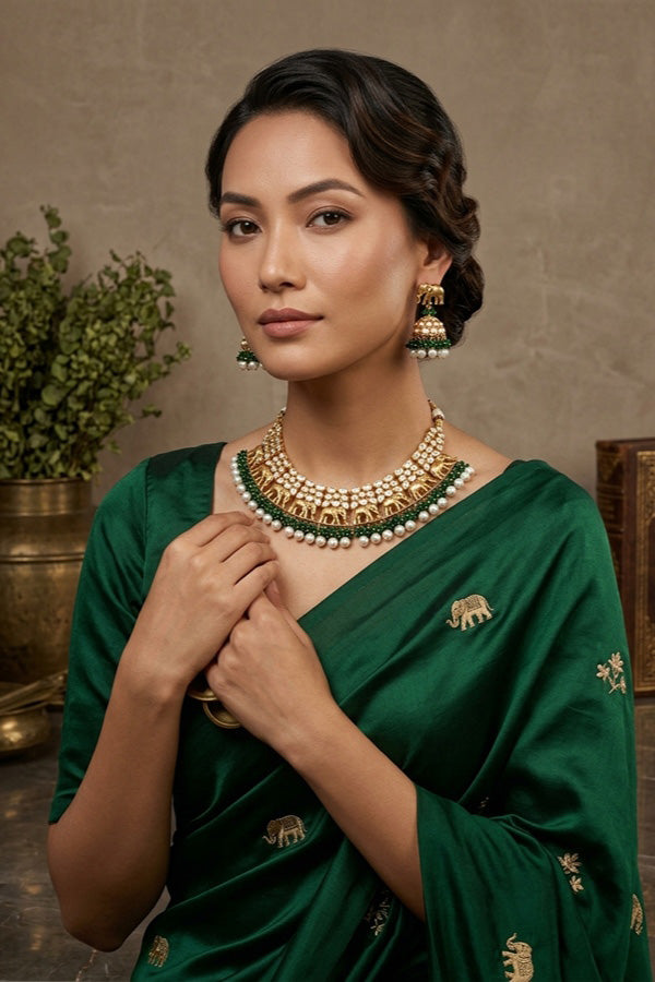 Elephant Motif Kundan Necklace Set With White Pearls And Green Beads Attached With Matching Jhumka Earrings (NKS034-G)