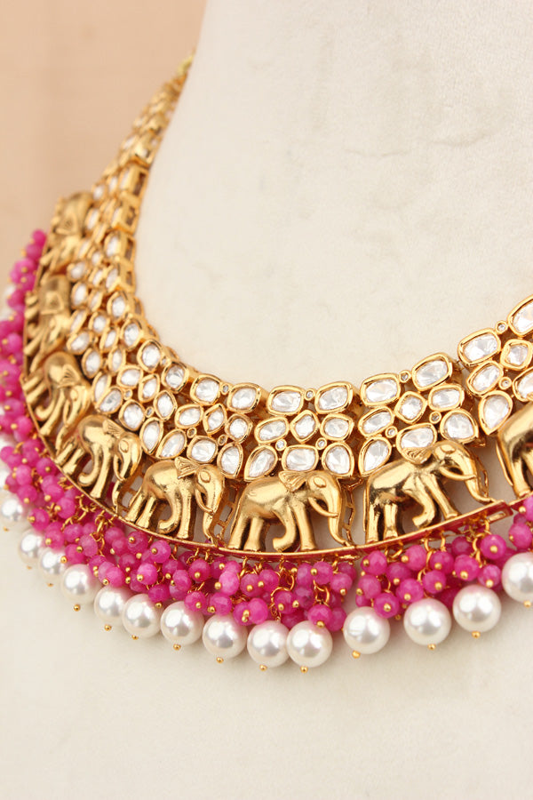 Elephant Motif Kundan Necklace Set With White Pearls And Pink Beads Attached With Matching Jhumka Earrings (NKS034-P)