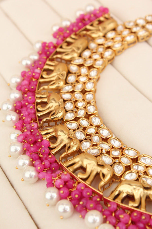 Elephant Motif Kundan Necklace Set With White Pearls And Pink Beads Attached With Matching Jhumka Earrings (NKS034-P)