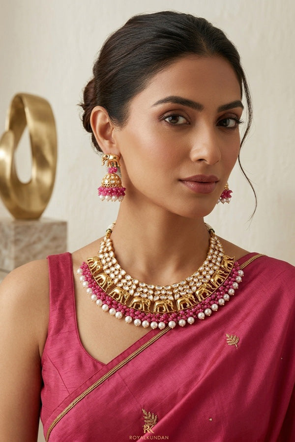Elephant Motif Kundan Necklace Set With White Pearls And Pink Beads Attached With Matching Jhumka Earrings (NKS034-P)