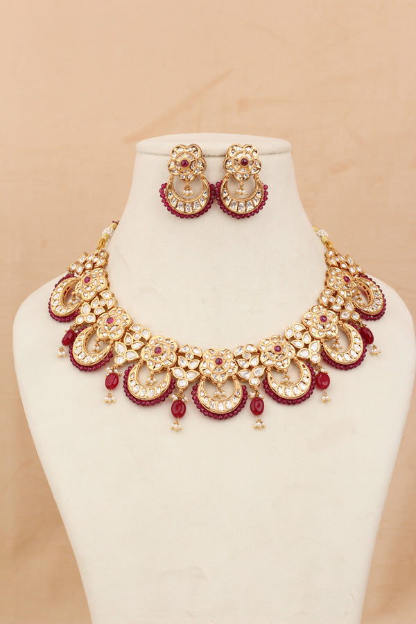Kundan Necklace Set With Flower Design And Individual Ruby Colour Pearls Attached With Same Design Earrings  (NS033RU-K)