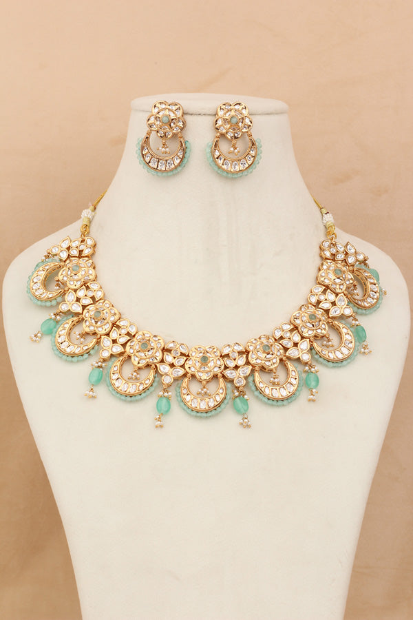 Kundan Necklace Set With Flower Design And Individual Sky Blue Colour Pearls Attached With Same Design Earrings  (NS033SB-Kundan)
