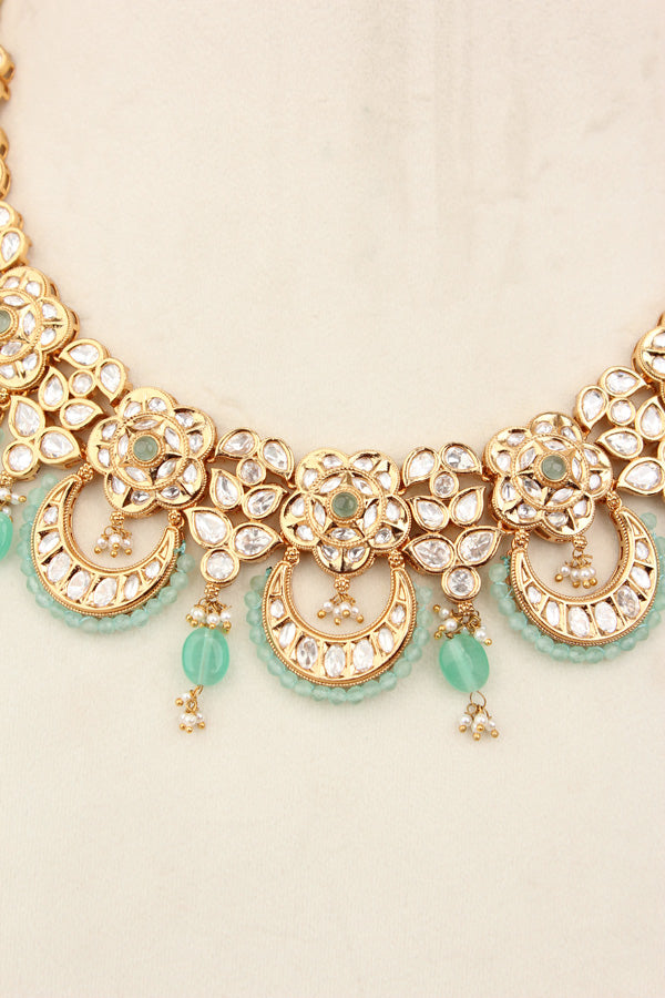 Kundan Necklace Set With Flower Design And Individual Sky Blue Colour Pearls Attached With Same Design Earrings  (NS033SB-Kundan)