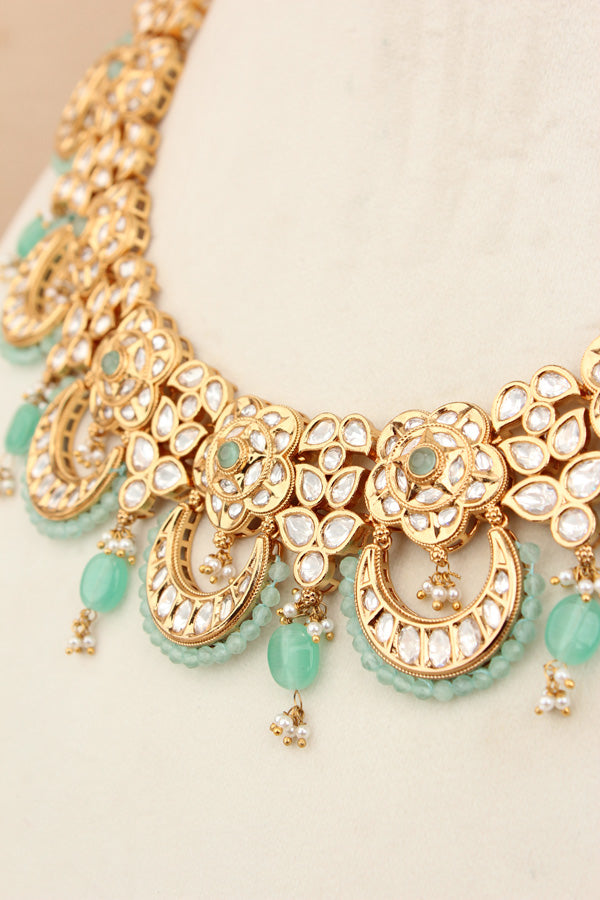 Kundan Necklace Set With Flower Design And Individual Sky Blue Colour Pearls Attached With Same Design Earrings  (NS033SB-Kundan)