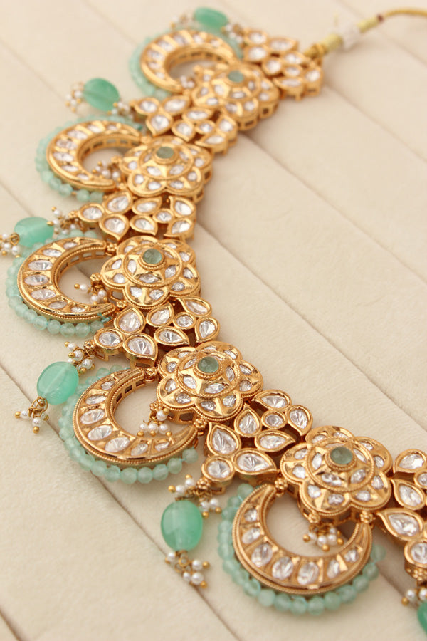 Kundan Necklace Set With Flower Design And Individual Sky Blue Colour Pearls Attached With Same Design Earrings  (NS033SB-Kundan)