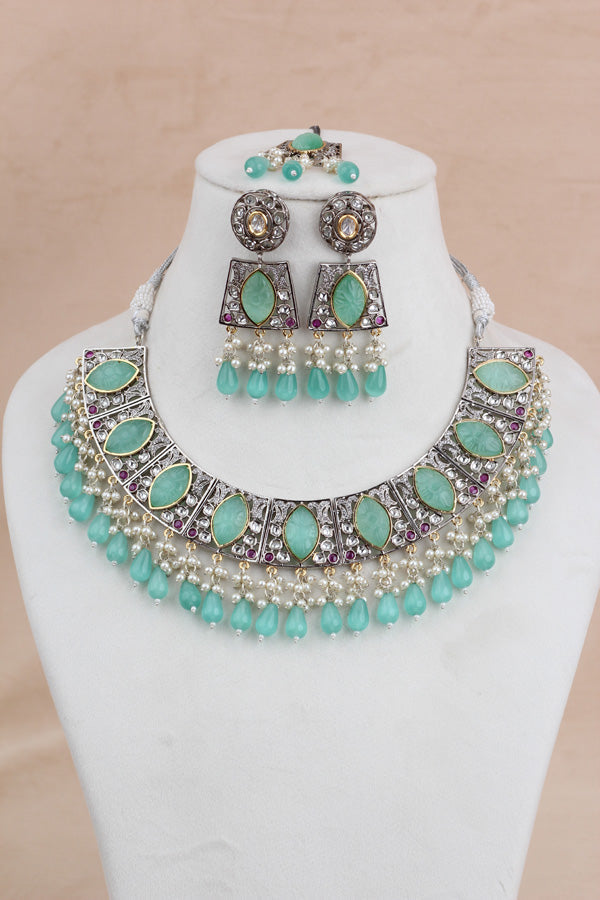 Light Silver Polish Kundan Necklace Set With Earrings And Tikka(IGNK010)