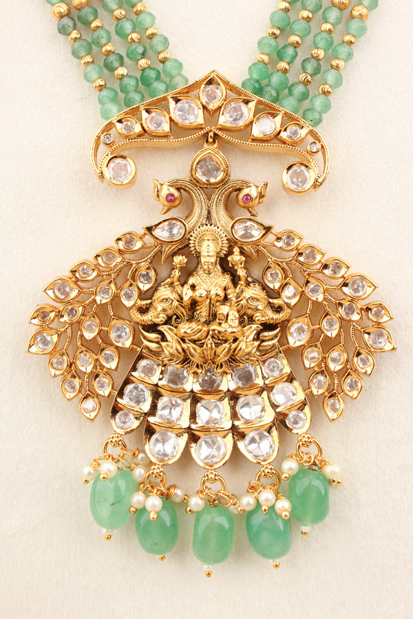 Maa Lakshmi Long Necklace Set With Light Green Pearls And Matching Earrings  (LKN009LG-Kundan)