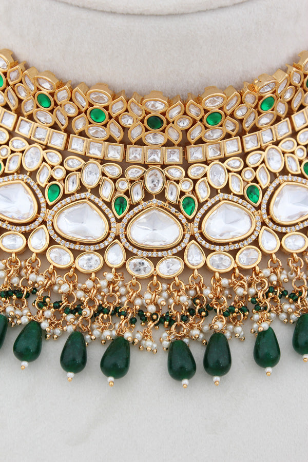 Necklace In Gold Polish With Kundan And Green Color Pearls Attached Also Large Earrings And Tikka(NK004-G-K-B1)