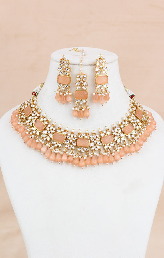 Peach Kundan Necklace Set With Matching Earrings And Tikka (IGNK011)