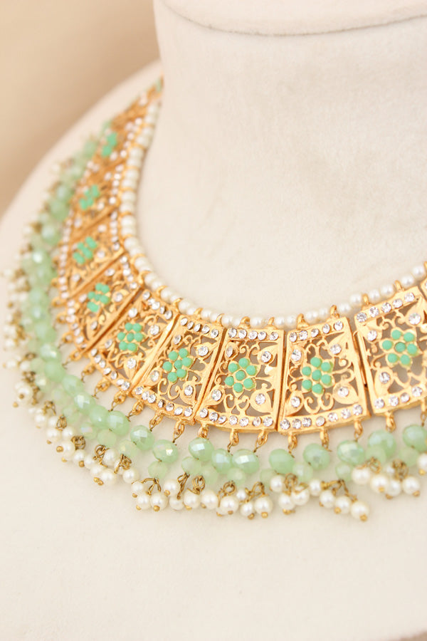 Punjabi Gold Plated Necklace Set with Light Green Beads Along With Earrings And Attached Saharey Also Tikka (PJNS001-LG)