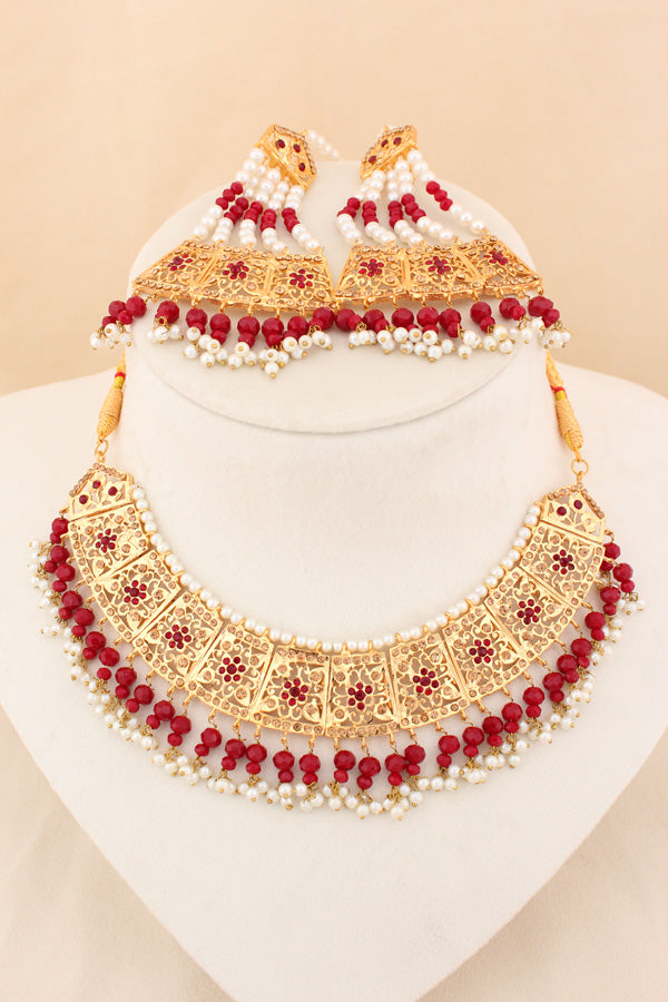 Punjabi Gold Plated Necklace Set with Red Beads Along With Earrings And Attached Saharey Also Tikka (PJNS001-R)