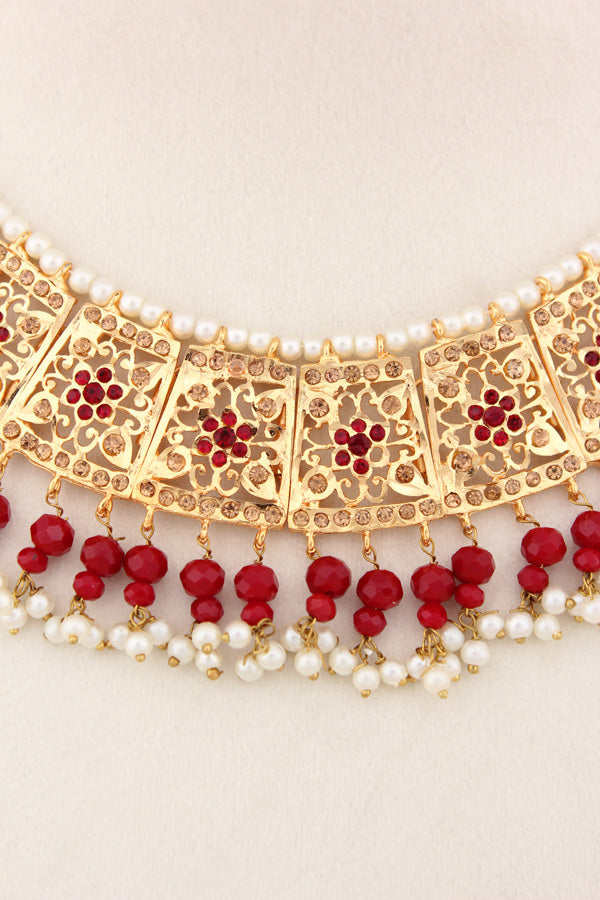 Punjabi Gold Plated Necklace Set with Red Beads Along With Earrings And Attached Saharey Also Tikka (PJNS001-R)