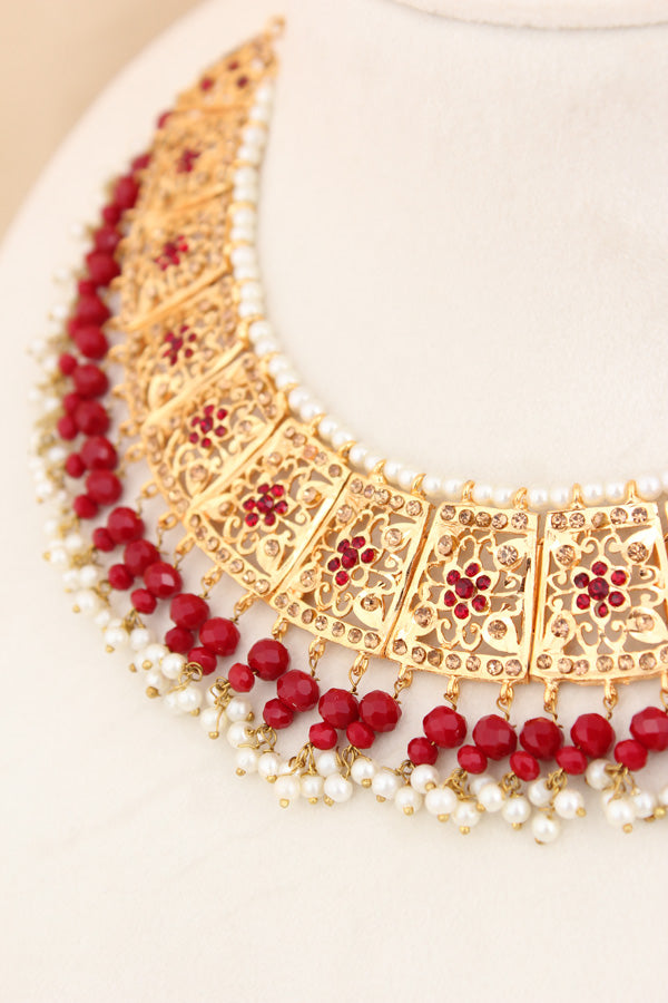 Punjabi Gold Plated Necklace Set with Red Beads Along With Earrings And Attached Saharey Also Tikka (PJNS001-R)