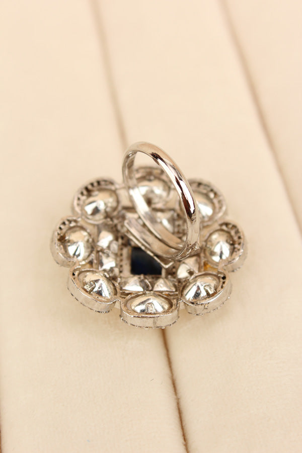 Silver Plated Quality Kundan Ring With Flower Design And Blue Colour Center Stone And Small American Diamonds (KR013-B)