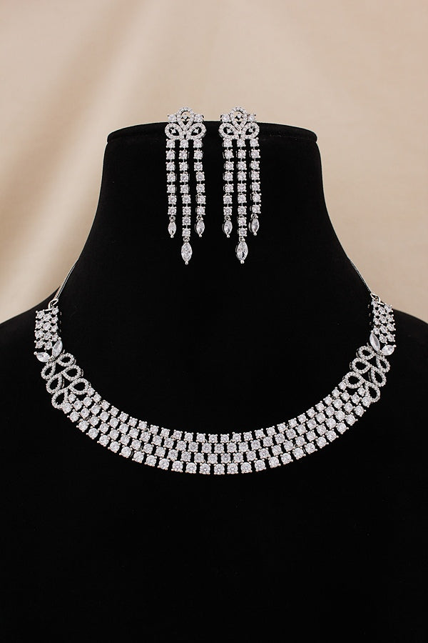 Triple Layer Necklace Set In A Glamorous And Royal Look With Silver Colour Stones And Long Matching Earrings (NS007-AD-S)