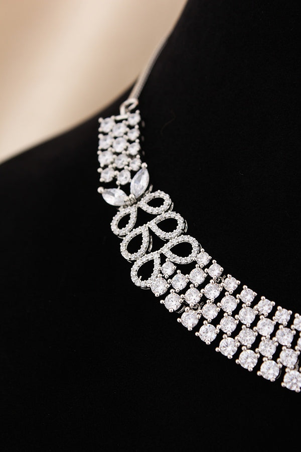 Triple Layer Necklace Set In A Glamorous And Royal Look With Silver Colour Stones And Long Matching Earrings (NS007-AD-S)