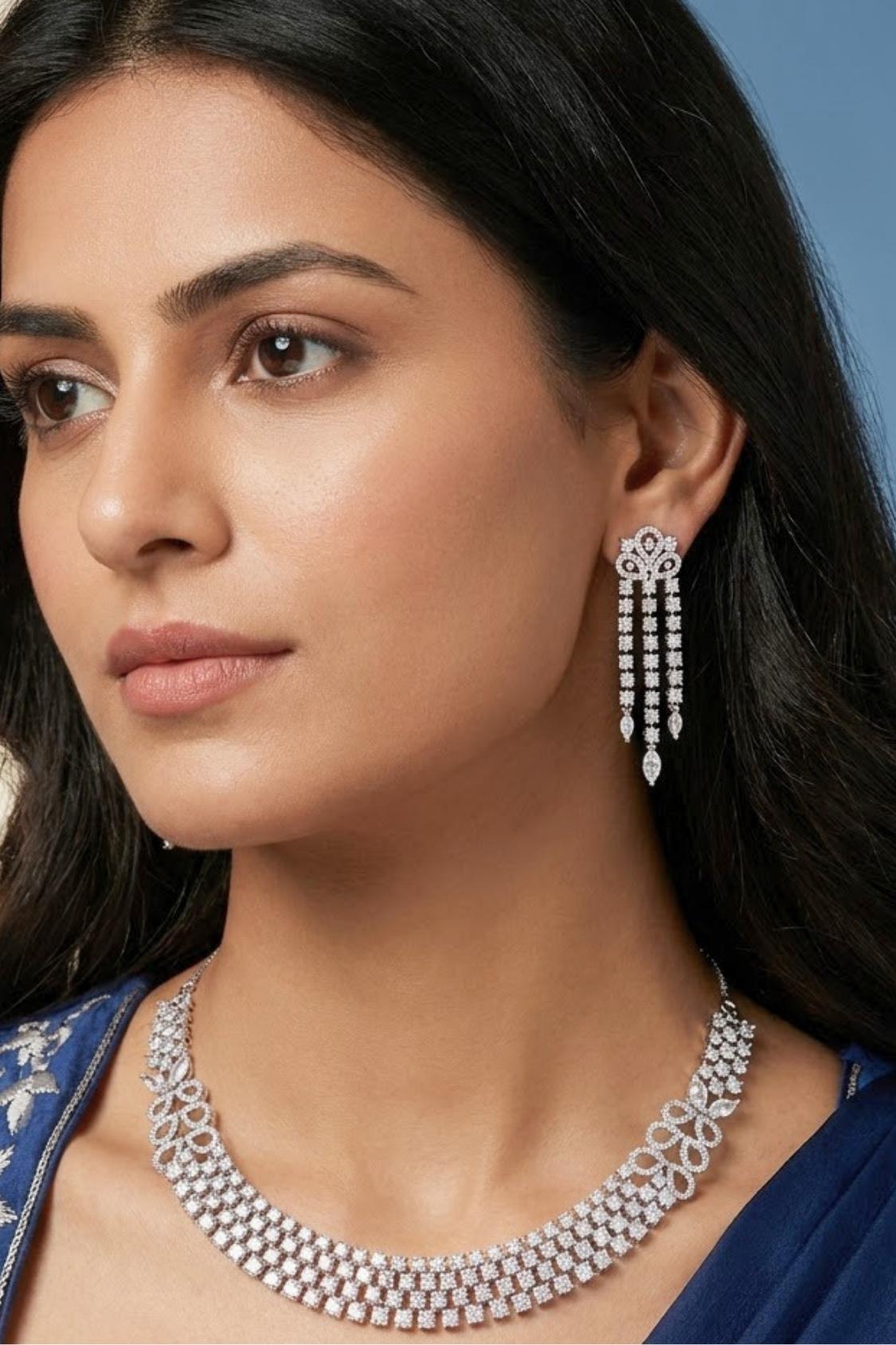 Triple Layer Necklace Set In A Glamorous And Royal Look With Silver Colour Stones And Long Matching Earrings (NS007-AD-S)